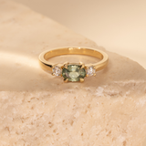 East-West Orbit 0.895ct Oval Green Sapphire