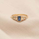 Posy 0.67ct Emerald-cut Blue Sapphire