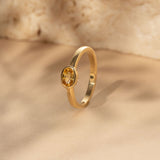 East-West 0.57ct Oval Yellow Sapphire