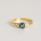 Teal Cushion Cut Sapphire with Pear Diamonds in 18ct Yellow Gold