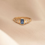 Posy 0.67ct Emerald-cut Blue Sapphire