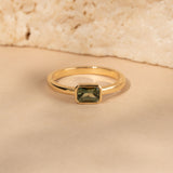East-West 0.66ct Emerald-cut Green Sapphire